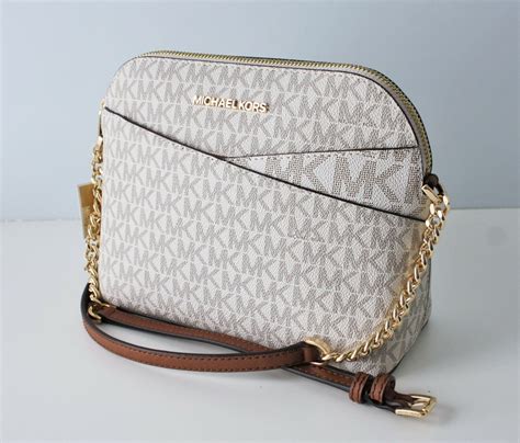 michael kors jet set travel md dome crossbody leather luggage|Amazon.com: Michael Kors Dome Crossbody.